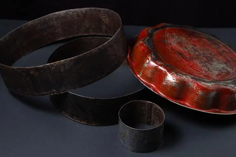 Old baking dishes. Forms for cake layers.  Stock Photos