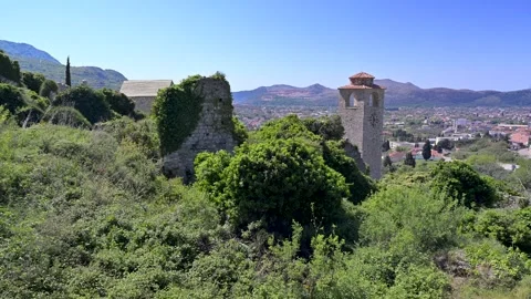 Old Bar fortress clock tower cityscape in Montenegro Stock Footage 338389228