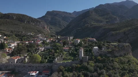 Old Bar Stari Bar ruins overlooking terraced village and rugged Montenegrin Stock Footage 336615951