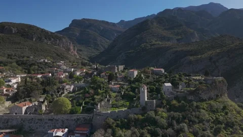 Old Bar Stari Bar ruins overlooking terraced village and rugged peaks Stock Footage 337077045