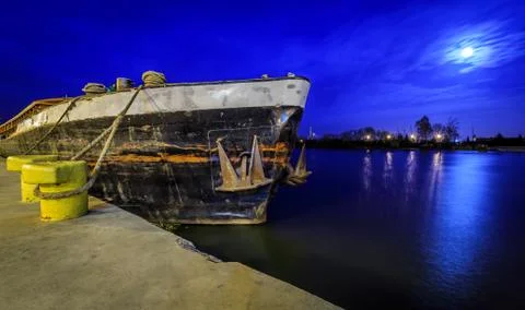 Old barge at night Foto stock