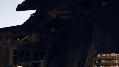 Old barn with broken roof and wooden barrel during clear day Stock Footage 343564844