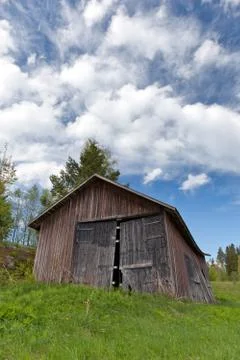 Old barn on a field Stock Photos