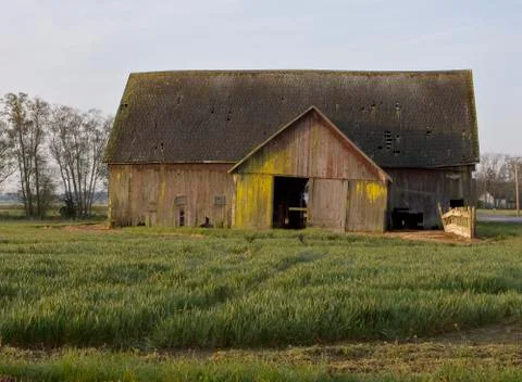 Old barn with field Stock Photos