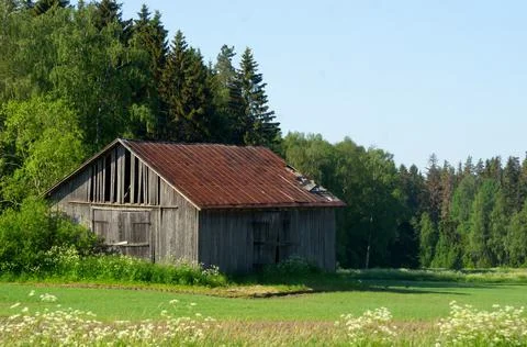 Old barn in a field Stock Photos