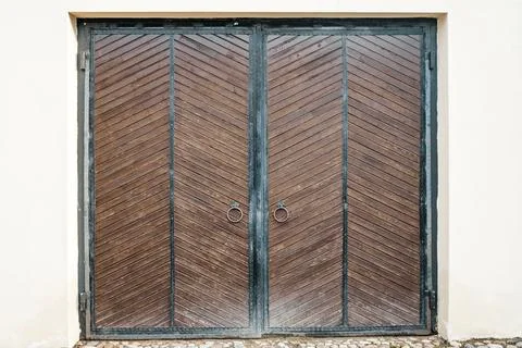 Old barn gate. Wooden rustic gate for a warehouse, stable or barn Stock Photos