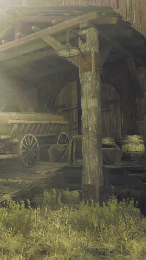 Old barn interior with cart and barrels at sunset in rural area Stock Footage 330274139