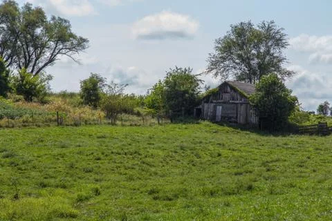 Old barn in a meadow Stock Photos