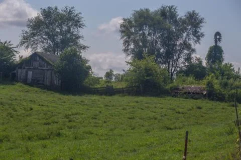 Old barn in a meadow Stock Photos