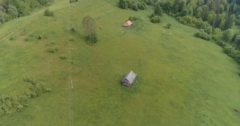 Old barn in mountains 4k drone aerial video Stock Footage 128697223