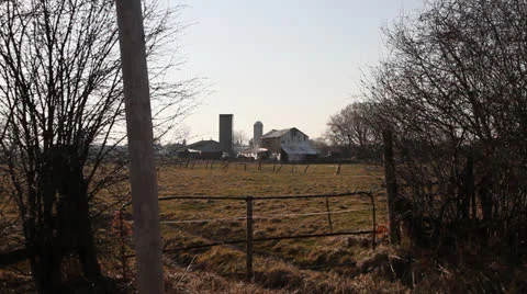 Old barn with peeling paint, wire fence and gate. HD 1080p 24fps. Stock Footage 22794517