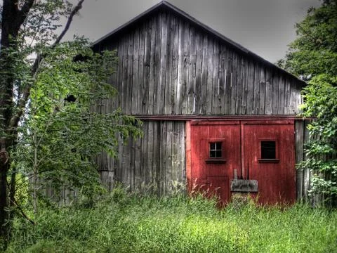 Old barn with red doors Stock Photos