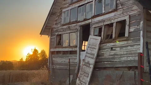 Old barn at sunset Stock Footage 205532996