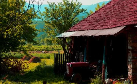 Old barn with tractor Stock Photos