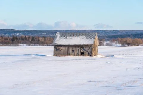 Old barn in winterscape Foto stock