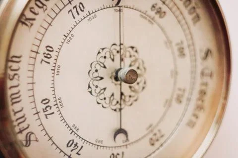 Old barometer dial close up with added grain Stock Photos