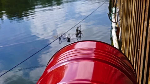 Old barrel on a harbour Stock Footage 266595691