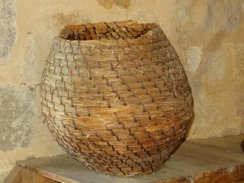 Old baskets for the collection of flour in the old mills Fotos Stock