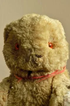 An old battered teddy bear Stock Photos