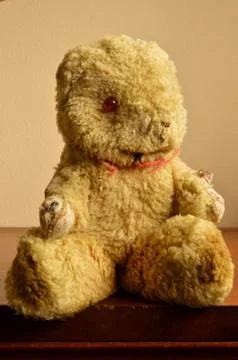 An old battered teddy bear 写真素材