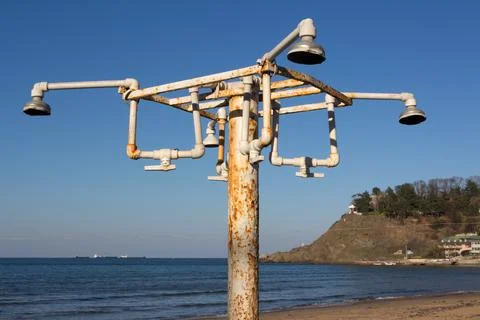 Old beach shower Stock Photos