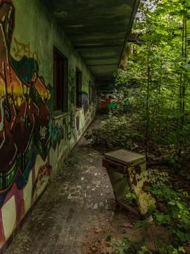 Old bedside table abandoned outside an abandoned shelter Stock Photos