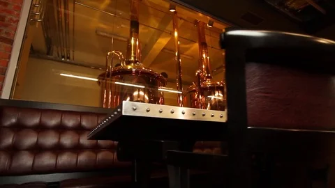 Old beer brewery pub. Interior design using old parts of brewery equipment Stock Footage 112641500