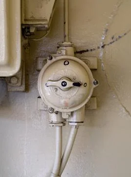 Old beige rotary switch on the deck of an icebreaker. Stock Photos