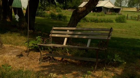 Old Bench and WindChimes 2 Stock Footage 35488975