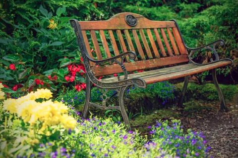 Old bench in the garden Stock Photos
