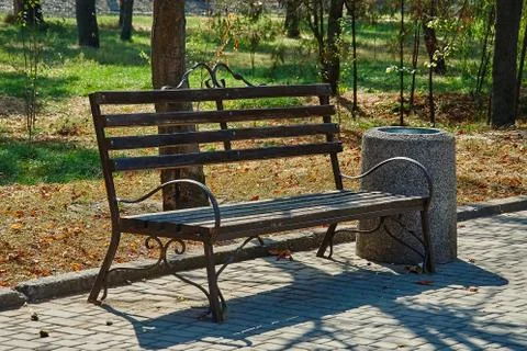 Old bench in a park Stock Photos