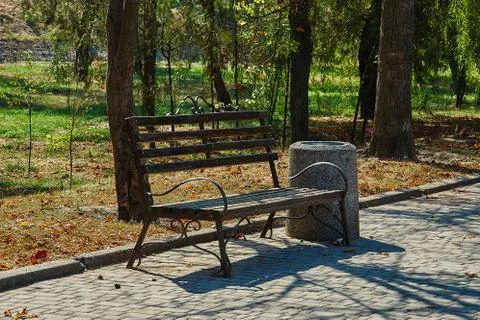 Old bench in a park Stock Photos