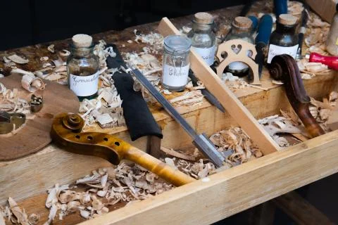 The old bench of violin makers in a workshop of a luthier Stock Photos