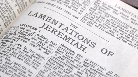 Old bible open to Lamentations Stock Footage 166850172