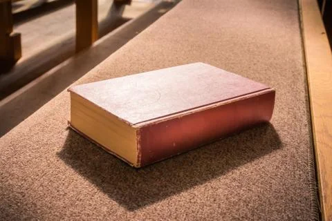 Old Bible Red Book Empty Template Lying Church Pew Bench Woodd Cushion Padd.. Stock Photos