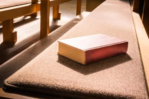 Old Bible Red Book Empty Template Lying Church Pew Bench Woodd Cushion Padd.. Stock Photos