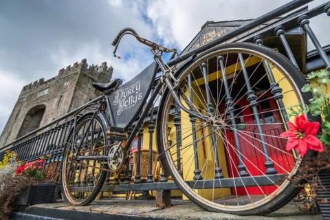 Old bicycle in front of a pub Stock Photos
