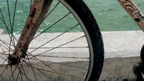 OLD BICYCLE IN  PROGRESO LIFE IN MERIDA YUCATAN MEXICO. PROGRESO YUCATAN Video stock 100799237