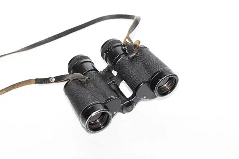 Old binoculars with strap Foto stock