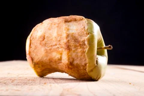 Old bitten apple Stock Photos