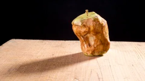 Old bitten apple Stock Photos