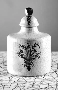 Old black and white pot 库存照片