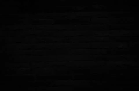 Old black brick wall texture for background with copy space for design. dark  Foto stock