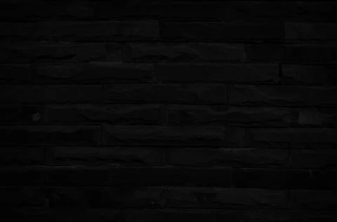 Old black brick wall texture for background with copy space for design. dark  Foto stock