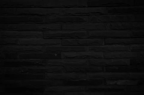 Old black brick wall texture for background with copy space for design. dark  Stock Photos