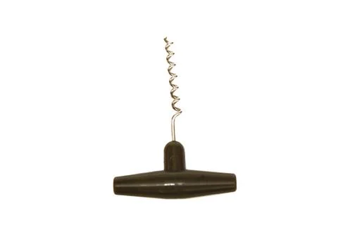 Old black corkscrew on white background Stock Photos
