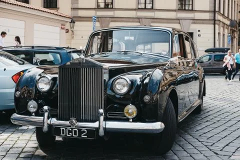 Old Black Rolls Royce car on a street in Prague, Czech Republic. Stock Photos