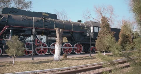 Old black Soviet steam engine train locomotive with a red star Stock Footage 127160051