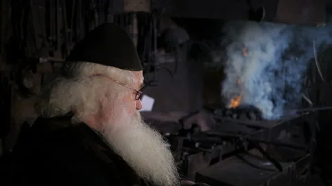 An old blacksmith Stock Footage 103866525