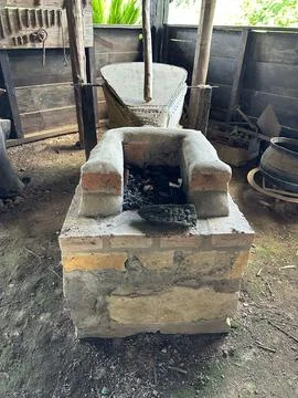 Old blacksmith&amp;#39;s forge in a craftsman&amp;#39;s workshop Stock Photos